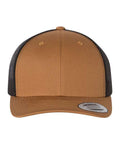 Caramel and black trucker cap on a white background