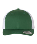 Dark green and white trucker cap on a white background