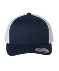 Navy and white trucker cap on a white background