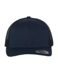 Navy blue trucker cap on a white background