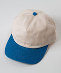 Vintage Style Hat Cerulean Blue and Natural - Natural and blue cap on a light gray background