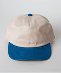 Vintage Style Hat Cerulean Blue and Natural - Beige and blue cap on a light gray background