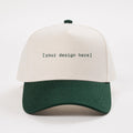 White and green cap with 'your design here' text on a white background