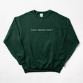 Green sweatshirt with 'your design here' text on a white background