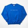 Blue sweatshirt with 'your design here' text on a white background