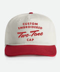 Custom Embroidered Two-Tone Hat - Two-tone red and white cap with embroidered red words on a white background