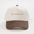 Baseball cap with 'your design here' text on a white background